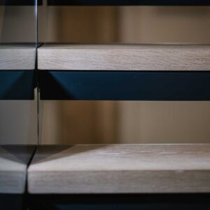 Close up of the wood treads and metal frame of a staircase