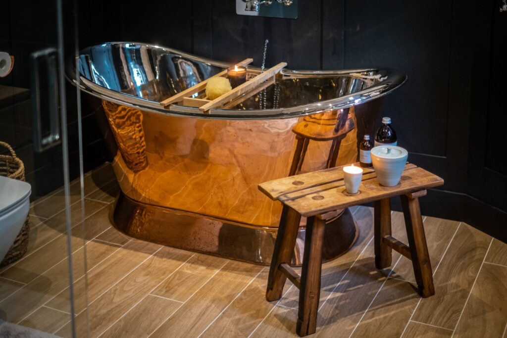 Bathroom with stunning copper bath