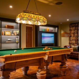 Luxury games room with bespoke Oak pool table, bespoke built in cabinetry and media wall
