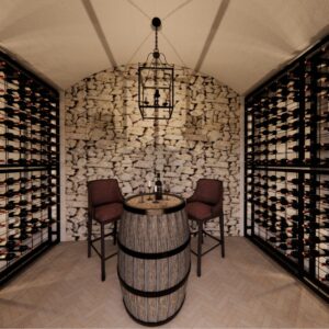 A render of a traditional Menorcan farmhouse wine cellar with seating for 2 around an old wine barrel and wine racks on both sides of the cellar
